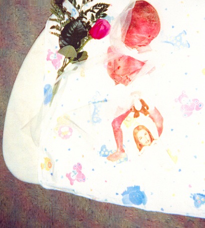 In Swaddling clothes
